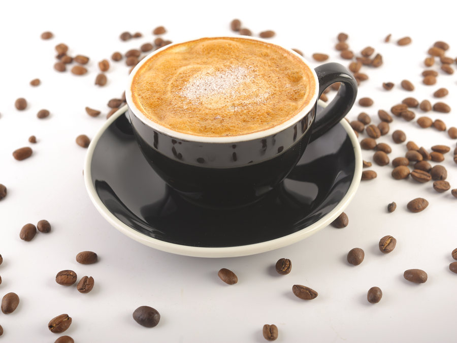 Cappuccino with coffee beans