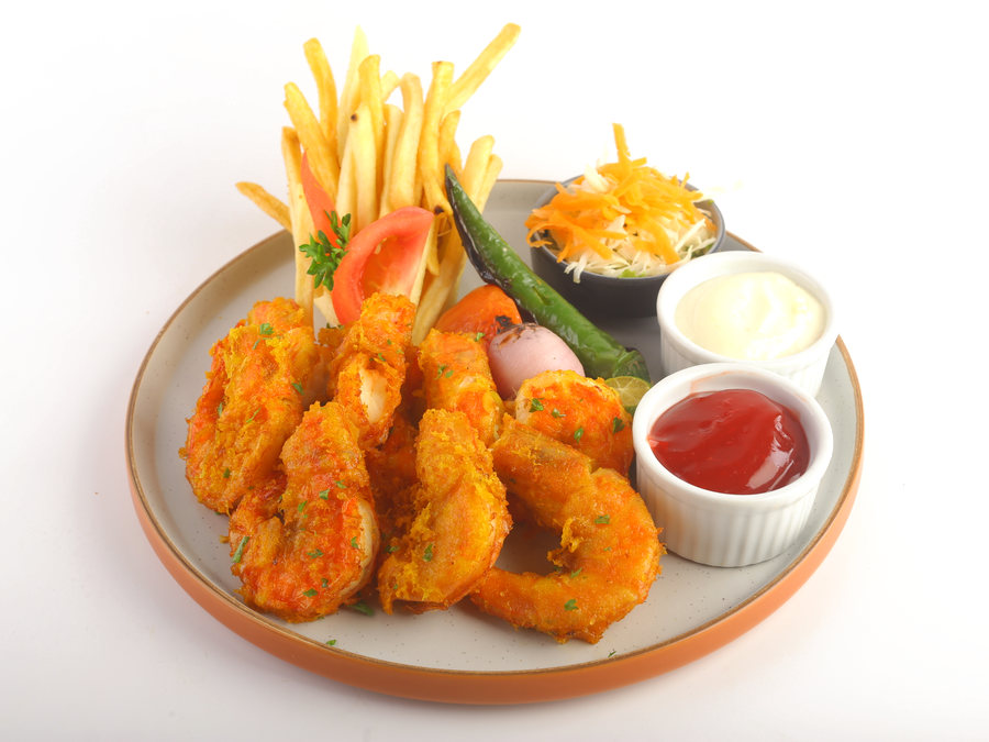 Crumbed fried prawns with fries